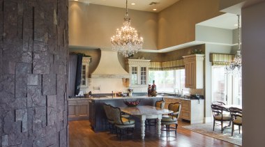 The kitchen also features a wood floor, fluted ceiling, floor, flooring, hardwood, home, interior design, laminate flooring, living room, lobby, loft, real estate, room, wall, wood, wood flooring, brown