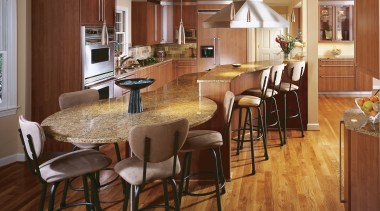 This kitchen, designed by CSI Kitchen &amp; Bath, cabinetry, countertop, dining room, floor, flooring, hardwood, interior design, kitchen, laminate flooring, room, wood, wood flooring, brown