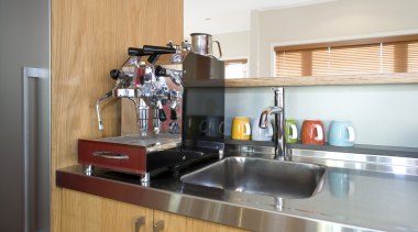 Kitchen designer Shane George suggests considering a coffee countertop, interior design, kitchen, real estate, room, white