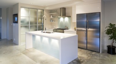 View of a kitchen which features underfloor heating countertop, floor, flooring, interior design, kitchen, real estate, gray