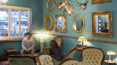 Furniture from yesteryear, mounted animal heads and mirrors blue, ceiling, chair, couch, furniture, home, house, interior design, living room, room, table, wall, window, teal