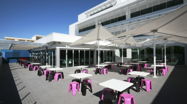 View the cafeteria area which features a crescent-shaped structure, gray