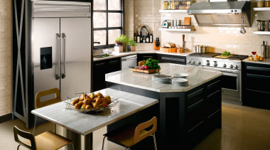 View of a kitchen which features a range, cabinetry, countertop, cuisine classique, interior design, kitchen, gray, brown