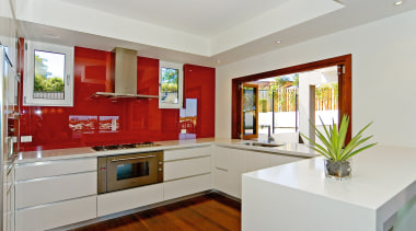 The house is built over six levels to countertop, home, interior design, kitchen, living room, property, real estate, room, gray