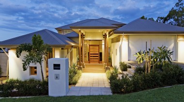 Coomera Waters in the burgeoning Brisbane to Gold cottage, elevation, estate, facade, home, house, lighting, mansion, property, real estate, residential area, roof, villa, teal