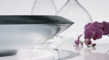 Image of a basin and tapware by the drinkware, glass, product design, purple, stemware, still life photography, table, tableware, tap, vase, water, wine glass, white