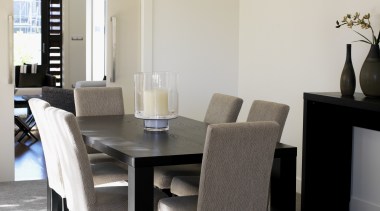 Feltex Carpets Classic Cayenne in colour Grey Mood chair, dining room, floor, flooring, furniture, interior design, living room, room, table, white, black