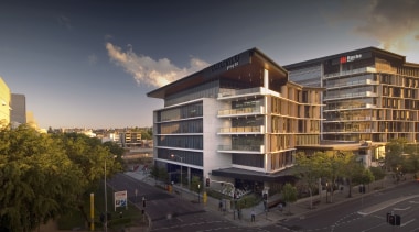 exterior view of the SW1 development which when apartment, architecture, building, city, commercial building, condominium, corporate headquarters, elevation, facade, home, house, metropolitan area, mixed use, neighbourhood, property, real estate, residential area, sky, suburb, black, gray