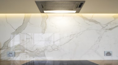 Image of the fully concealedrangehood which provides great ceiling, design, floor, product design, tile, wall, white