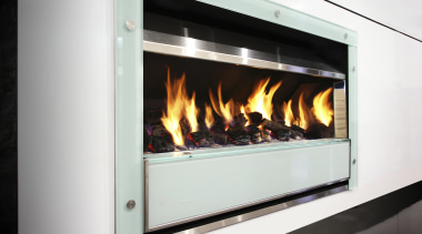 Flameboyant designs and makes a range of fires fireplace, hearth, heat, wood burning stove, white