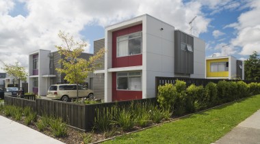 This Housing New Zealand Devlopment features modular homes, architecture, corporate headquarters, elevation, facade, home, house, neighbourhood, property, real estate, residential area, white