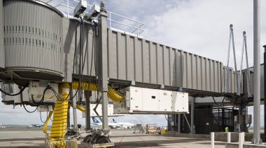 Images of the outside of Auckland International Airport jet bridge, transport, gray, white