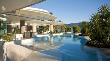 Exterior view of the outdoor area which features estate, home, house, leisure, property, real estate, resort, resort town, swimming pool, vacation, villa, water, teal