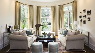 View of one of the lounge areas showing ceiling, couch, furniture, home, interior design, living room, real estate, room, window, window treatment, white