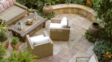 View of a small shaded garden which features backyard, courtyard, furniture, garden, landscaping, outdoor structure, patio, table, yard, brown