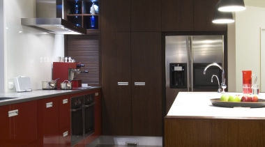 View of open-planned kitchen which features a kitchen countertop, interior design, kitchen, room, gray, black