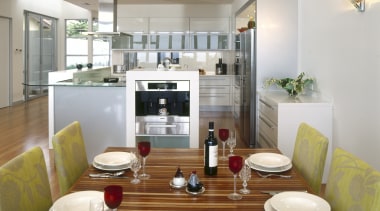 View of kitchen and dining area which features apartment, dining room, interior design, kitchen, living room, property, real estate, room, white, brown