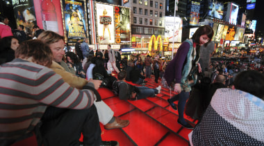 View of the new TKTS ticketing booth in crowd, street, black