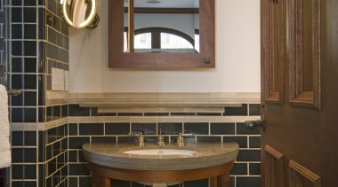 Image of the woodwork incorporated into this home. bathroom, cabinetry, estate, flooring, home, interior design, room, wall, brown