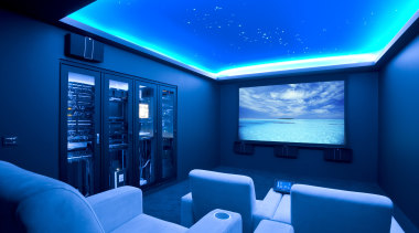 View of home cinema with projector screen, audiovisual blue, ceiling, display device, interior design, lighting, room, technology, blue