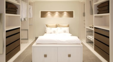 Image of bedroom which features cabinetry made by bed frame, bedroom, cabinetry, chest of drawers, floor, flooring, furniture, home, interior design, product, room, orange