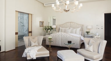 view of the master bedroom which features wooden bed frame, bedroom, ceiling, floor, furniture, home, interior design, living room, real estate, room, suite, white