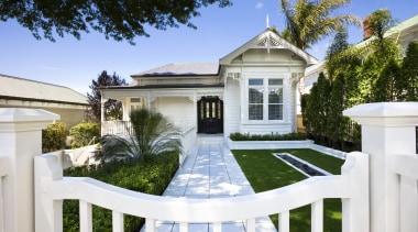 View of white house with light-toned interior with backyard, cottage, estate, facade, home, house, mansion, property, real estate, residential area, villa, white