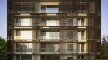 Exterior view of an apartment building which features apartment, architecture, building, commercial building, condominium, corporate headquarters, elevation, facade, headquarters, house, mixed use, real estate, residential area, window, brown