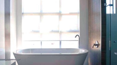 View of the bathroom of a high-end custom architecture, bathroom, bathtub, ceiling, daylighting, floor, interior design, plumbing fixture, room, window, white, gray, black