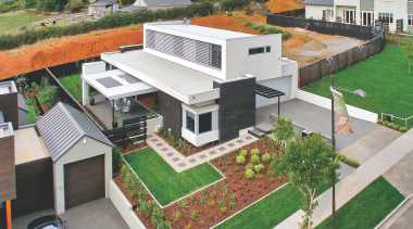 An exterior view of concrete cladding from Celcrete. elevation, home, house, neighbourhood, property, real estate, residential area, roof, suburb, white