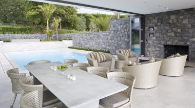 Image of stone walls which have been built chair, estate, house, interior design, property, real estate, table, white