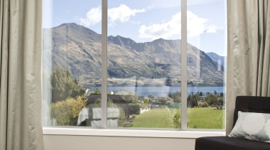View of the master bedroom inside a home bed frame, bedroom, curtain, daylighting, door, estate, home, house, interior design, living room, property, real estate, room, sash window, shade, window, window covering, window treatment, wood, gray