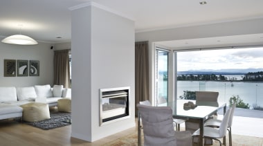 View of the Through Wall Minimal fireplace from floor, flooring, home, interior design, living room, property, real estate, window, wood flooring, gray