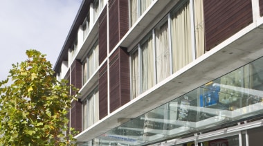 Exterior view of a building in Carlaw Park apartment, architecture, building, commercial building, condominium, facade, house, metropolitan area, mixed use, neighbourhood, real estate, residential area, white