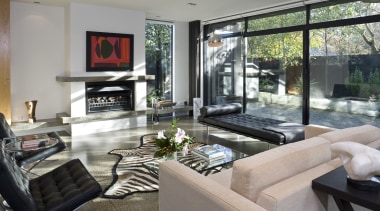 View of living room which features a day home, house, interior design, living room, property, real estate, window, gray