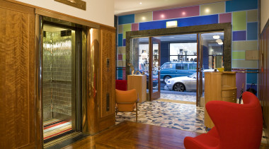 View of the entrance which features pieces of interior design, living room, lobby, real estate, room, brown