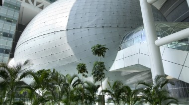 Exterior view of the Fusionopolis commercial/residential tower which architecture, biome, building, condominium, daylighting, dome, structure, tourist attraction, tree, gray