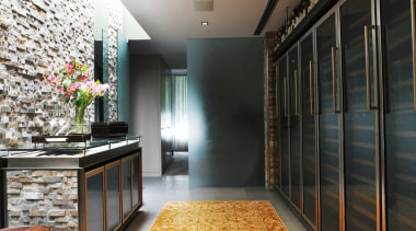 View of an apartment which features wine storage ceiling, floor, flooring, home, interior design, lobby, real estate, wall, wood, black, brown