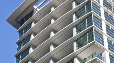 external view of apartment tower above a landscaped apartment, architecture, building, commercial building, condominium, corporate headquarters, daylighting, daytime, elevation, facade, headquarters, house, line, metropolitan area, mixed use, property, real estate, residential area, sky, tower block, urban area, window, gray, blue