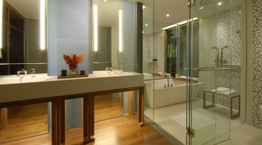 View of a bathroom which features a custom-manufactured bathroom, floor, flooring, interior design, room, brown