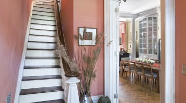 View of a staircase which features timber steps, apartment, ceiling, estate, floor, flooring, handrail, hardwood, home, interior design, property, real estate, stairs, wood, wood flooring, gray, red