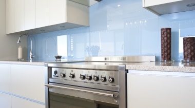 View of a kitchen which features Smeg appliances cabinetry, countertop, cuisine classique, home appliance, interior design, kitchen, kitchen stove, white