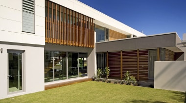 Exterior view of the front of this home architecture, elevation, estate, facade, home, house, property, real estate, residential area, roof, siding, window, brown