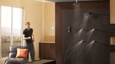 View of a shower enclosure which features several ceiling, floor, flooring, furniture, interior design, room, wall, black