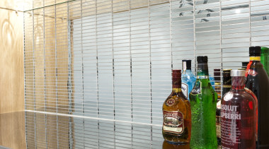 This storage/bar unit by Yellowfox features an Bestwood architecture, flooring, glass, interior design, table, tile, wall, white