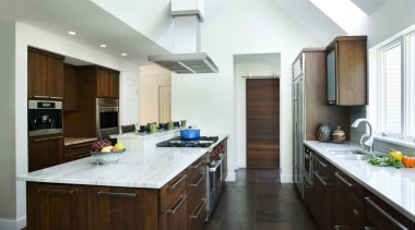 View of a kitchen which features white quartzite cabinetry, countertop, cuisine classique, interior design, kitchen, real estate, room, white, brown
