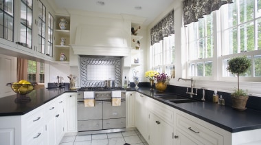 View of hand-built Lacanche French ranges offered by countertop, cuisine classique, home, interior design, kitchen, property, real estate, room, window, gray