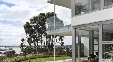 View of a large apartment development in Auckland apartment, architecture, building, condominium, estate, home, house, mixed use, outdoor furniture, property, real estate, residential area, sunlounger, white, gray