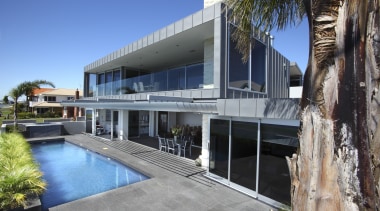 Zinc cladding featuring an angled seam, manufactured and apartment, architecture, building, condominium, house, property, real estate, villa, gray, teal