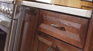 View of Decora Cabinetry's custom made cabinets. - cabinetry, countertop, drawer, furniture, kitchen, table, wood stain, red